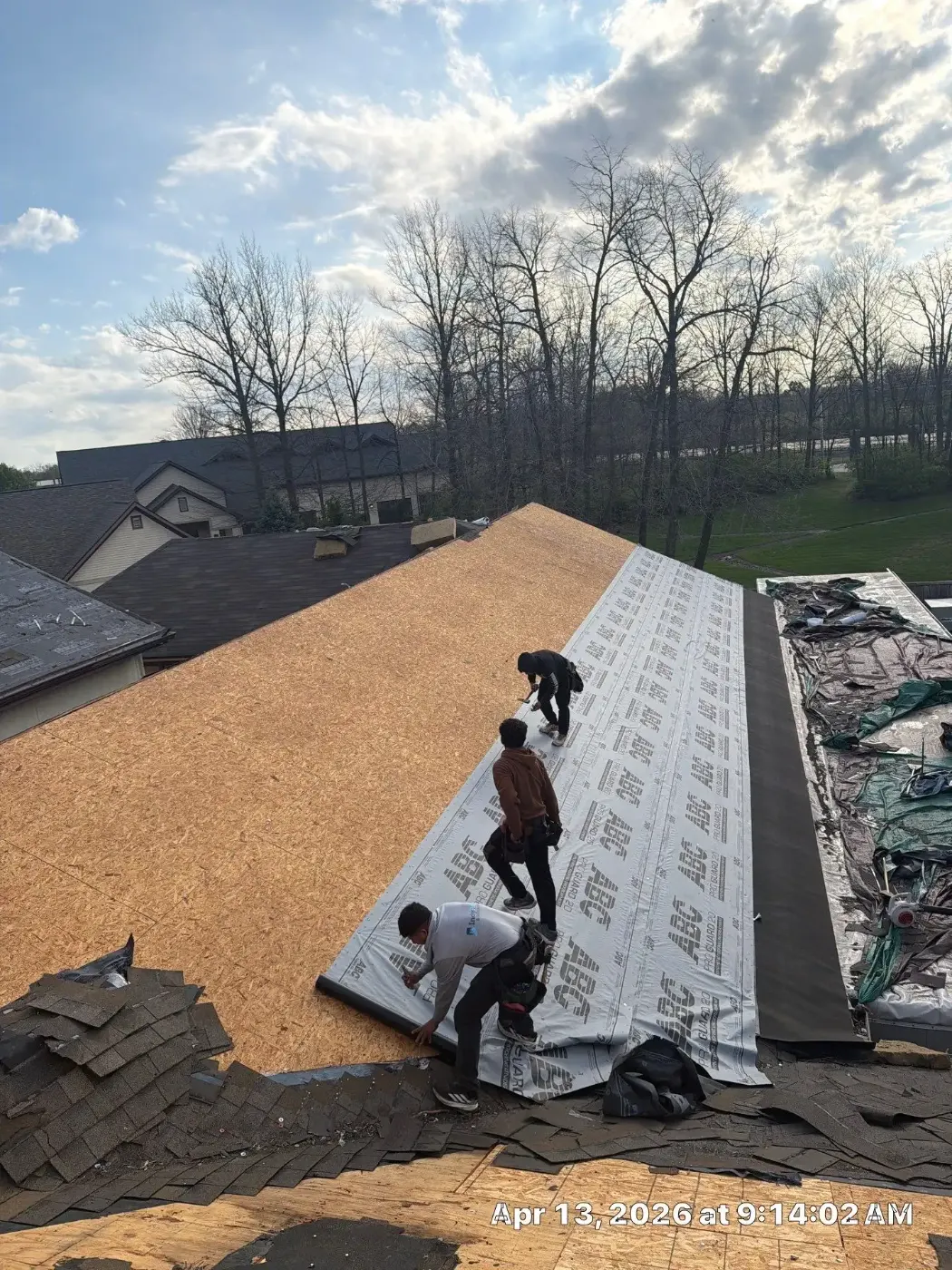Tarping and dry-in on a Hobart commercial roof